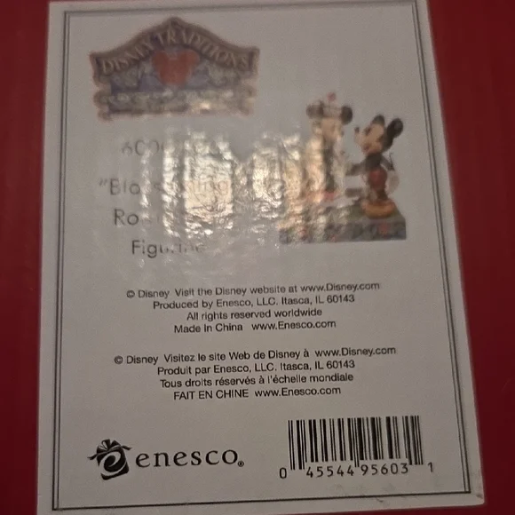 Jim Shore Disney Sculpture with Pink and Red Accents